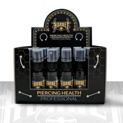 Présentoir lotion piercing Hornet contenant 24 sprays de 30 ml